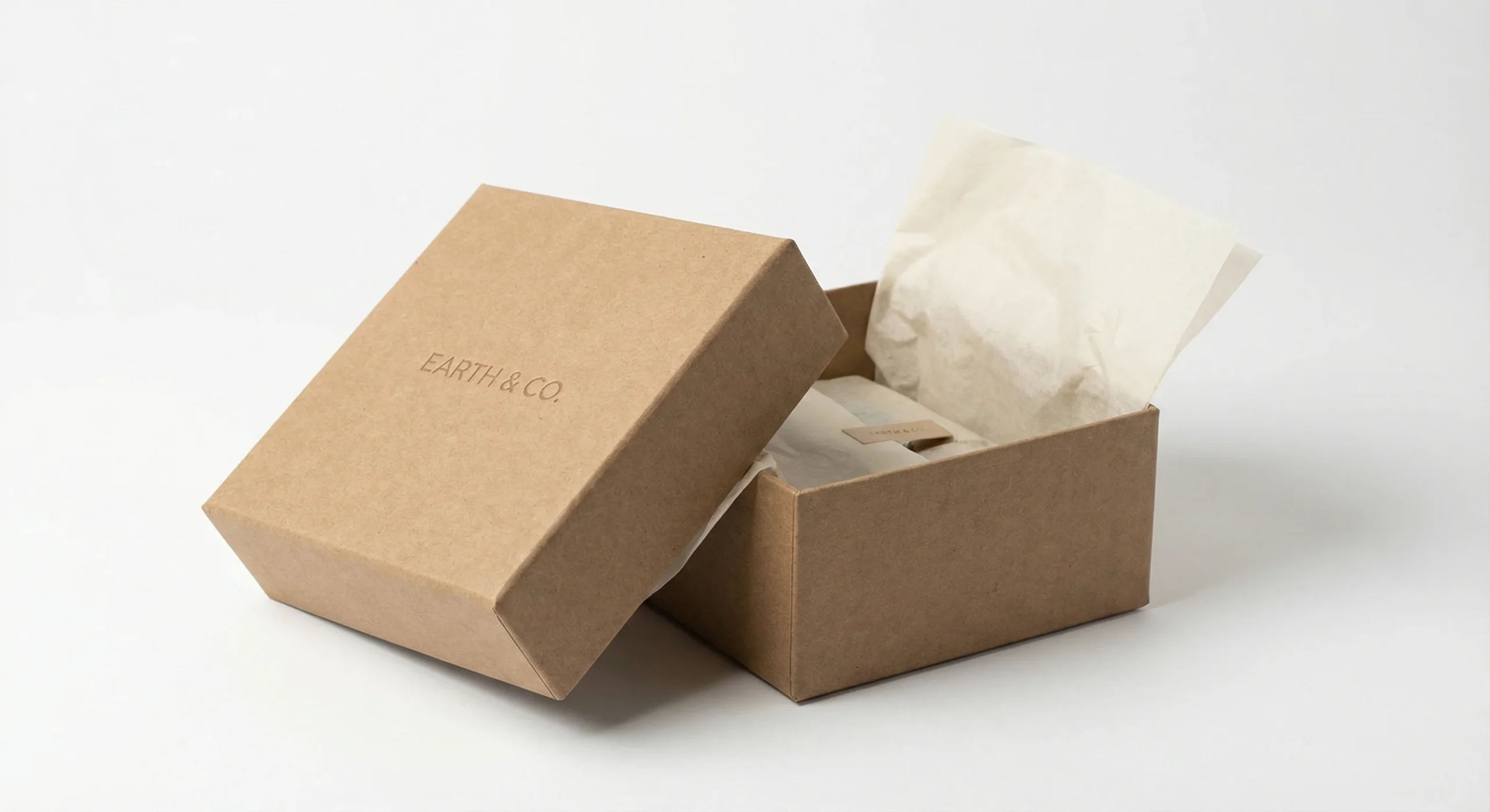 Close-up detail of FSC-certified cardboard materials used for custom compostable boxes with a recycling logo.